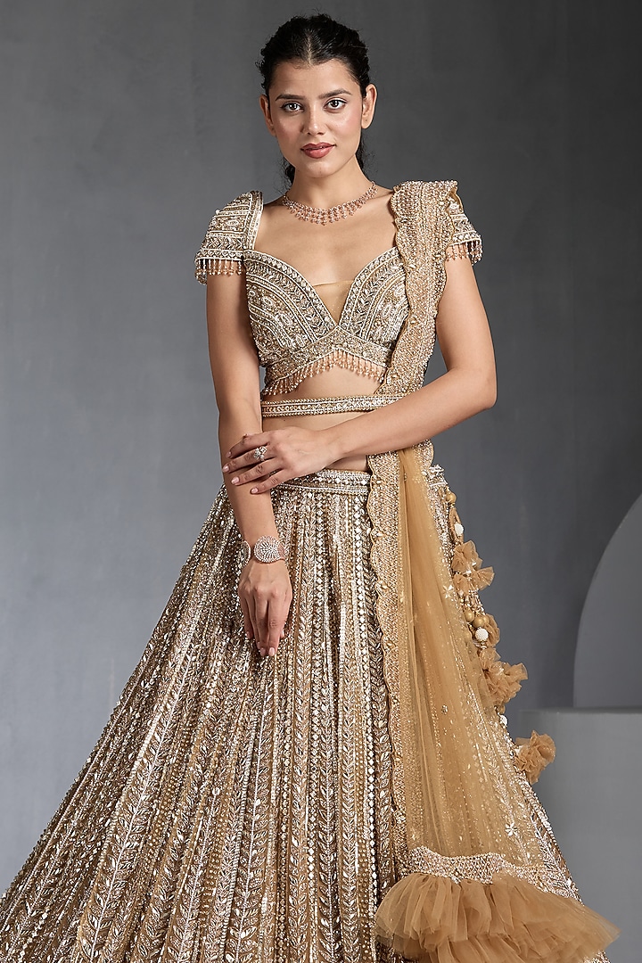 Gold Net Sequins & Pearl Embellished Bridal Lehenga Set by Chaashni by Maansi and Ketan at Pernia's Pop Up Shop
