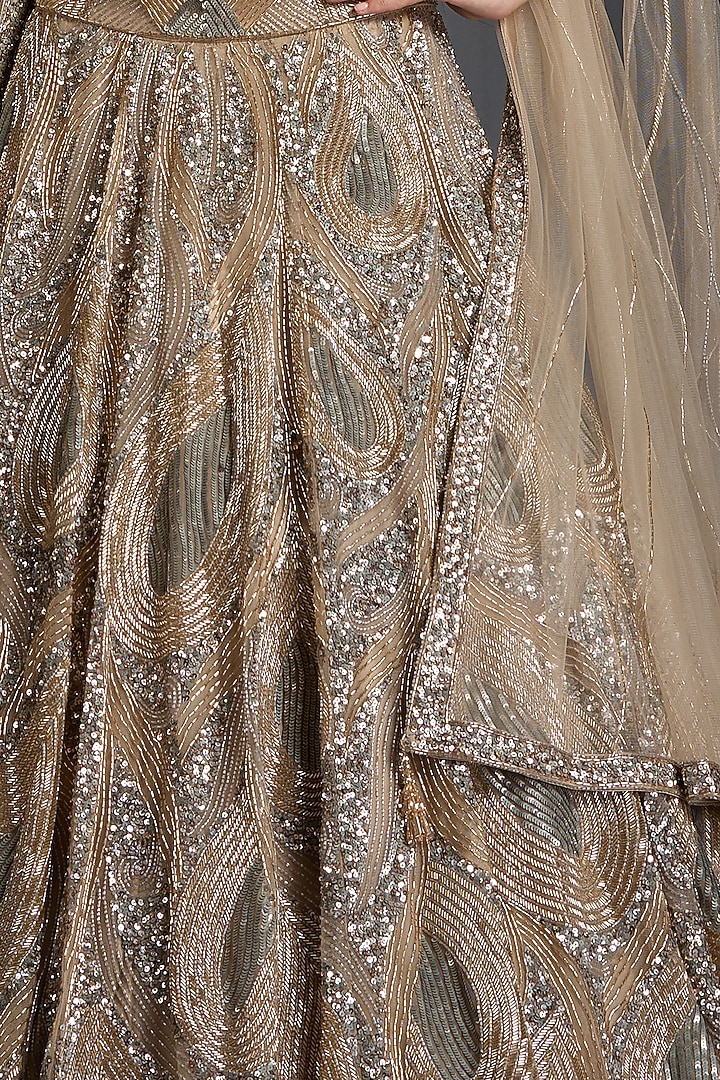 Nude Net Sequins & Feather Embellished Bridal Lehenga Set by Chaashni by Maansi and Ketan at Pernia's Pop Up Shop