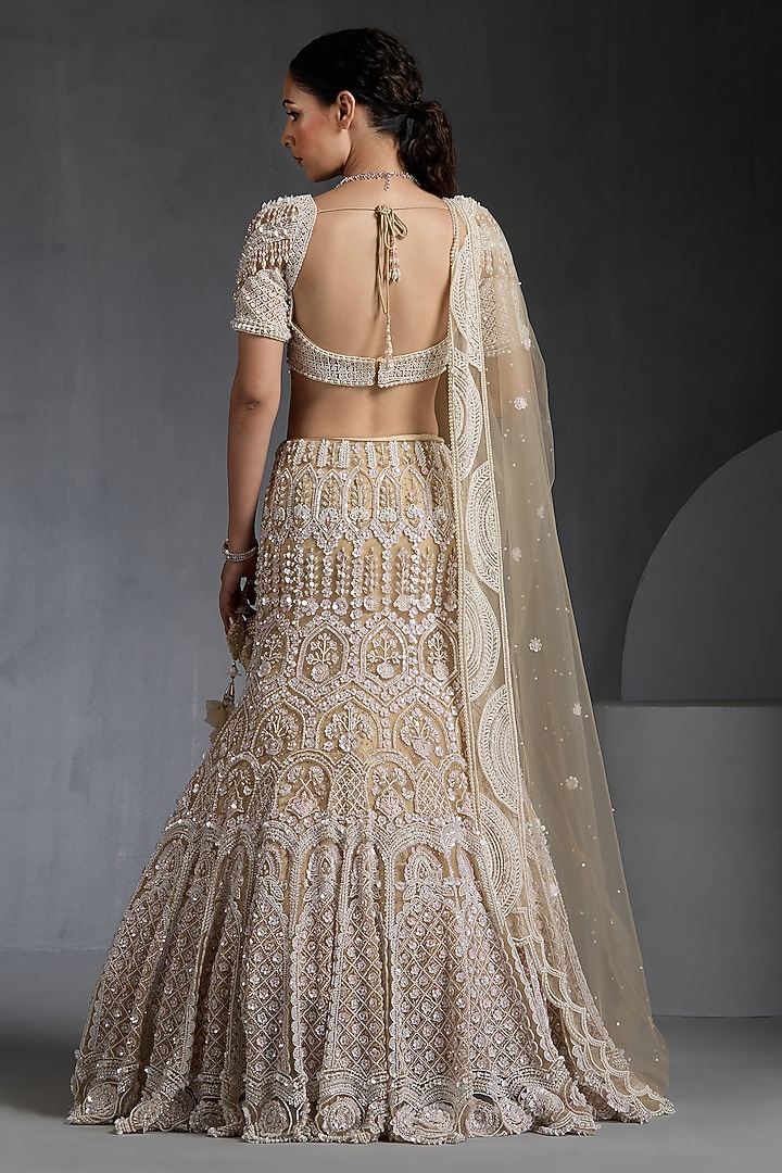 Ivory Net Sequins & Cutdana Embellished Bridal Lehenga Set by Chaashni by Maansi and Ketan at Pernia's Pop Up Shop
