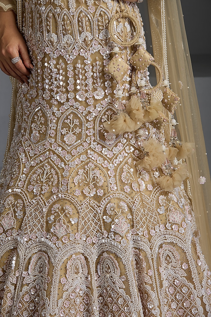 Ivory Net Sequins & Cutdana Embellished Bridal Lehenga Set by Chaashni by Maansi and Ketan at Pernia's Pop Up Shop