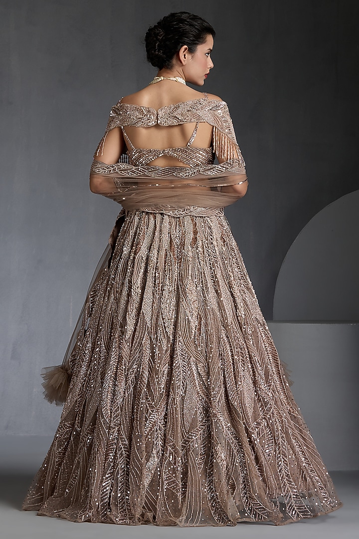 Champagne Net Sequins & Zirconss Embellished Bridal Lehenga Set by Chaashni by Maansi and Ketan at Pernia's Pop Up Shop