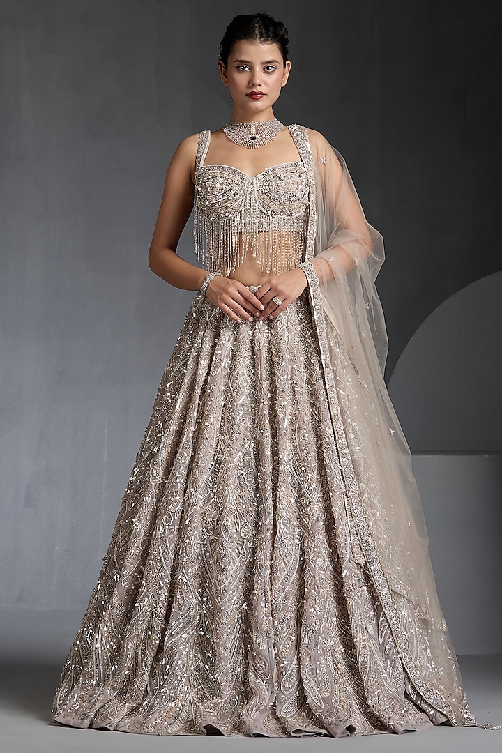 Ash Grey Net Sequins Embellished Bridal Lehenga Set by Chaashni by Maansi and Ketan at Pernia's Pop Up Shop