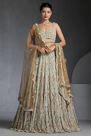 Gold Net Sequins & Stone Embellished Lehenga Set by chaashni by maansi and ketan-MORE FROM Chaashni by Maansi and Ketan