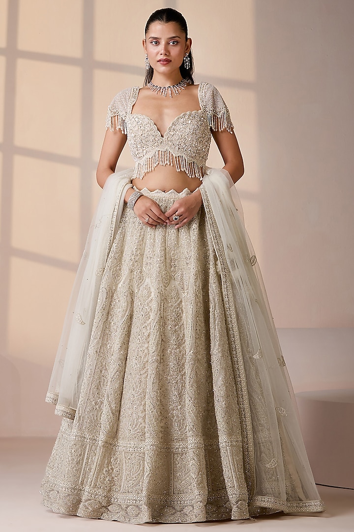 Off-White Net Embellished Wedding Lehenga Set by Chaashni by Maansi and Ketan at Pernia's Pop Up Shop