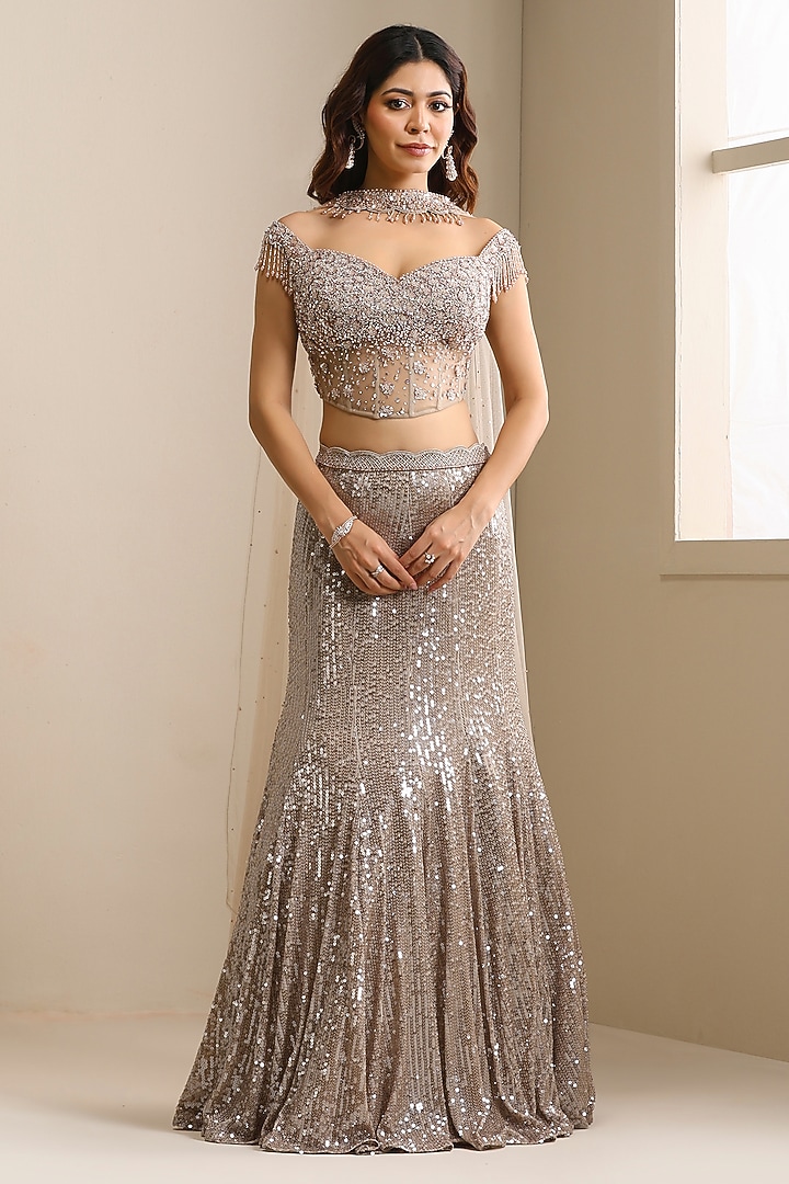 Champagne Net Sequins Embellished Wedding Lehenga Set by Chaashni by Maansi and Ketan at Pernia's Pop Up Shop