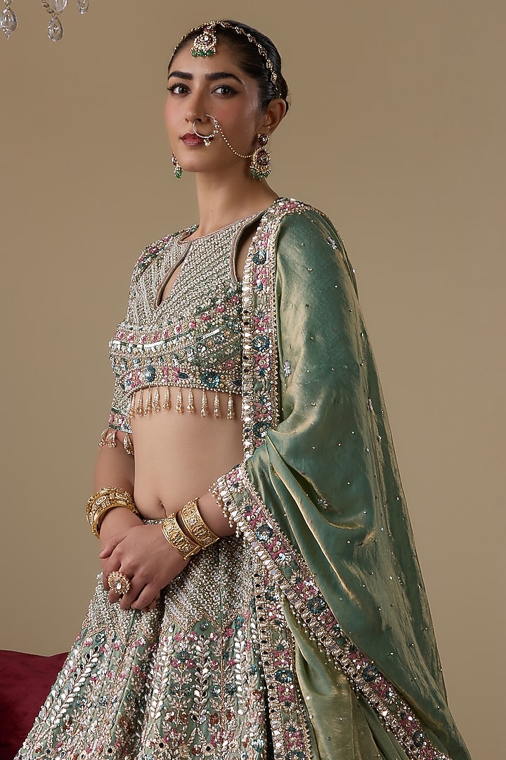 Green Net Zircon Embellished Bridal Lehenga Set by Chaashni by Maansi and Ketan at Pernia's Pop Up Shop