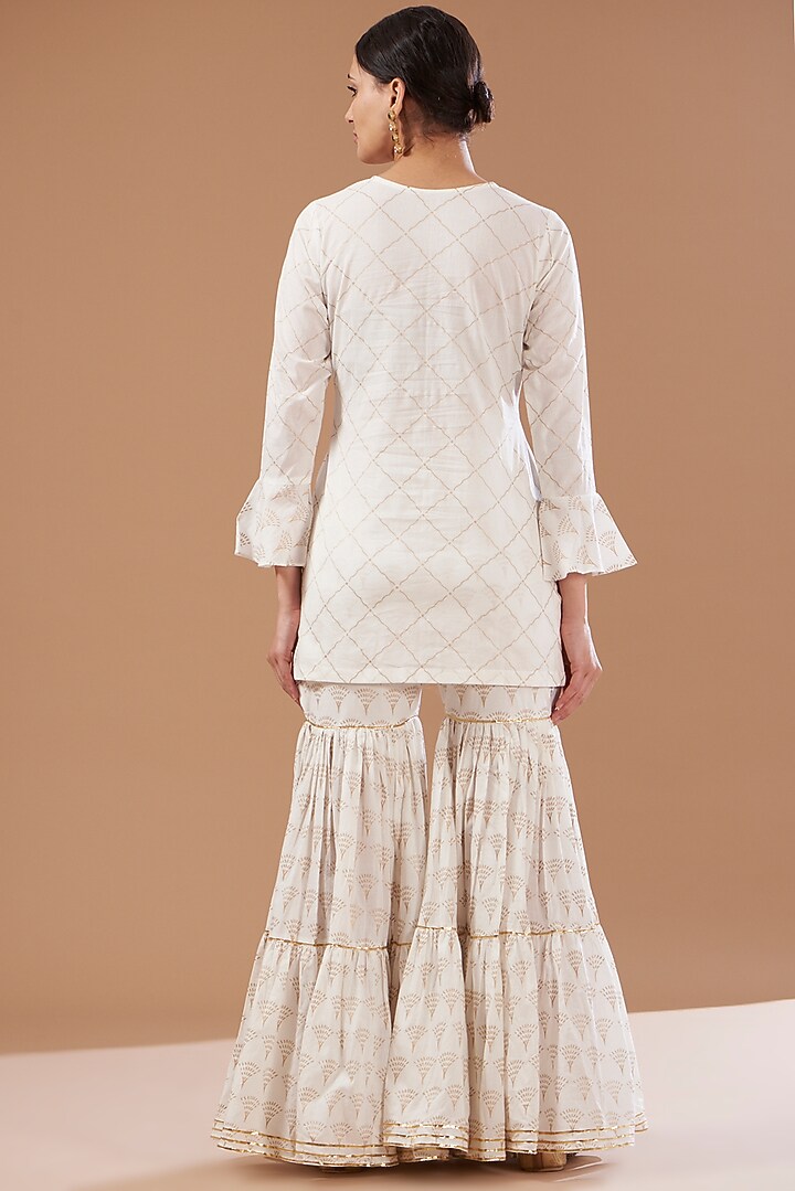 Ivory Cotton Sharara Set by CHITRASHI JAIPUR at Pernia's Pop Up Shop