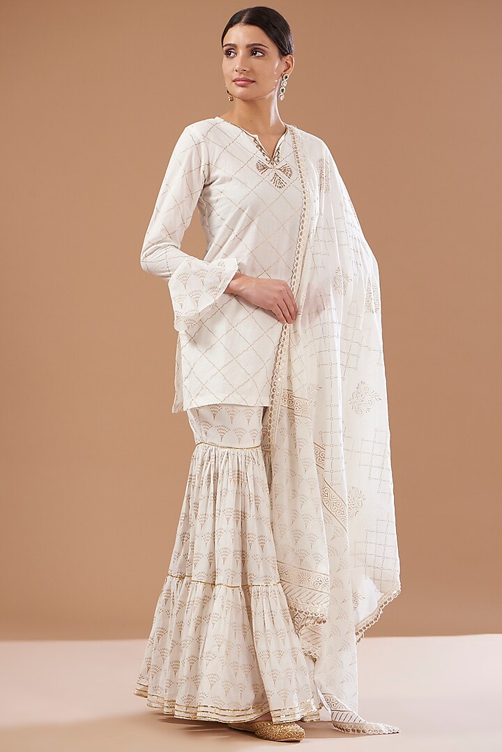Ivory Cotton Sharara Set by CHITRASHI JAIPUR at Pernia's Pop Up Shop