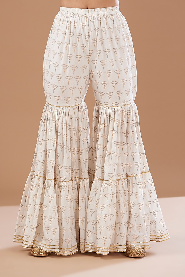 Ivory Cotton Sharara Set by CHITRASHI JAIPUR at Pernia's Pop Up Shop