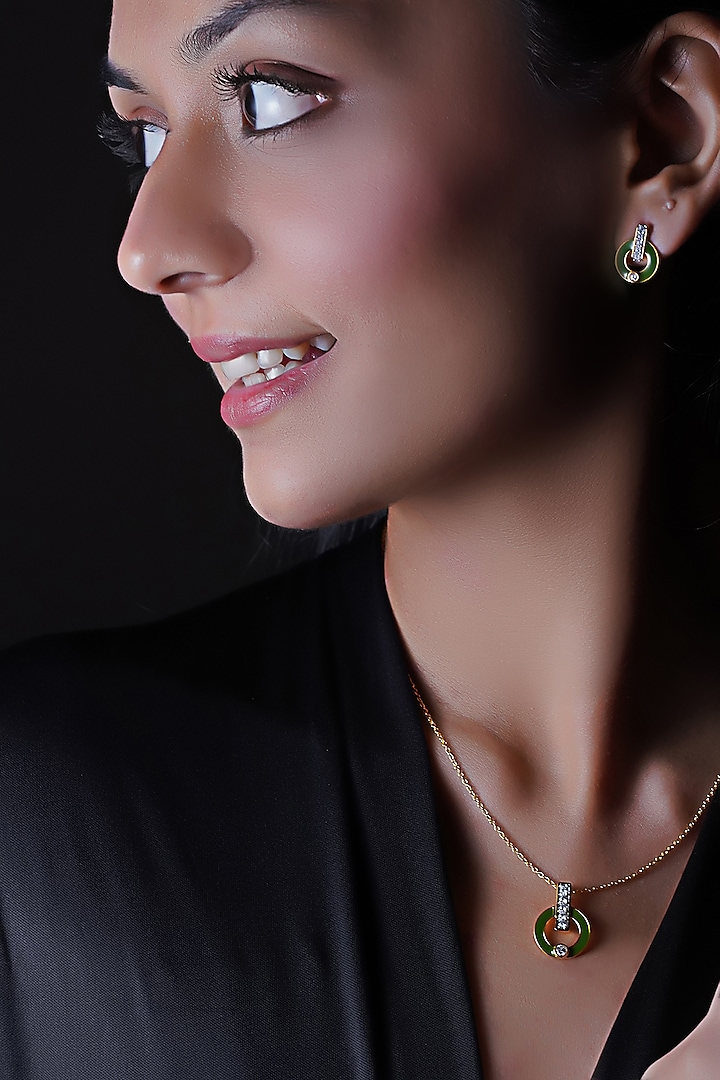 Gold Finish Cubic Zirconia Enameled Stud Earrings In Sterling Silver by CHIVRI