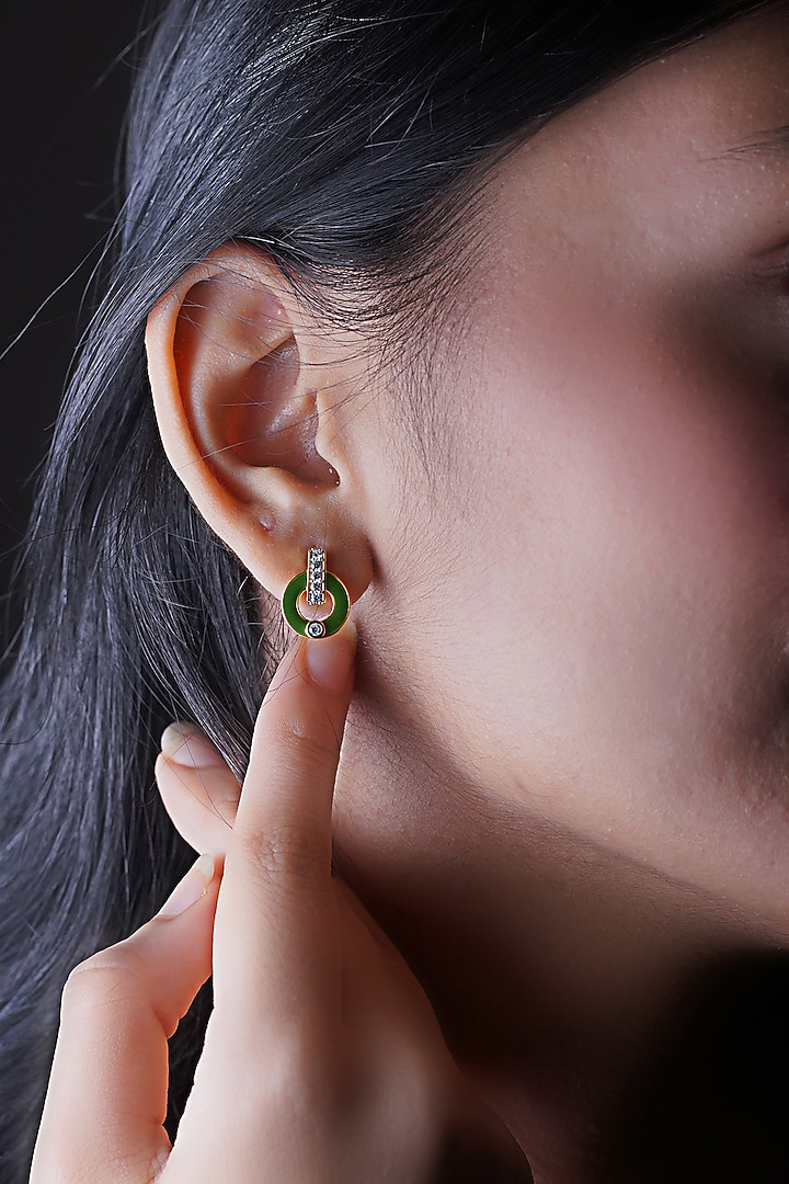 Gold Finish Cubic Zirconia Enameled Stud Earrings In Sterling Silver by CHIVRI at Pernia's Pop Up Shop