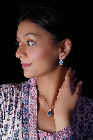 White Finish Blue Gem Stone Dangler Earrings In Sterling Silver by CHIVRI