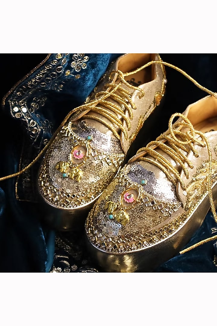 Gold Vegan Leather Embellished Sneakers by Chal Jooti at Pernia's Pop Up Shop