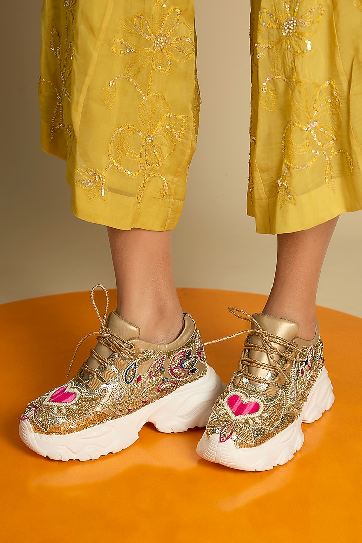 Gold Vegan Leather Embroidered Sneakers by Chal Jooti at Pernia's Pop Up Shop