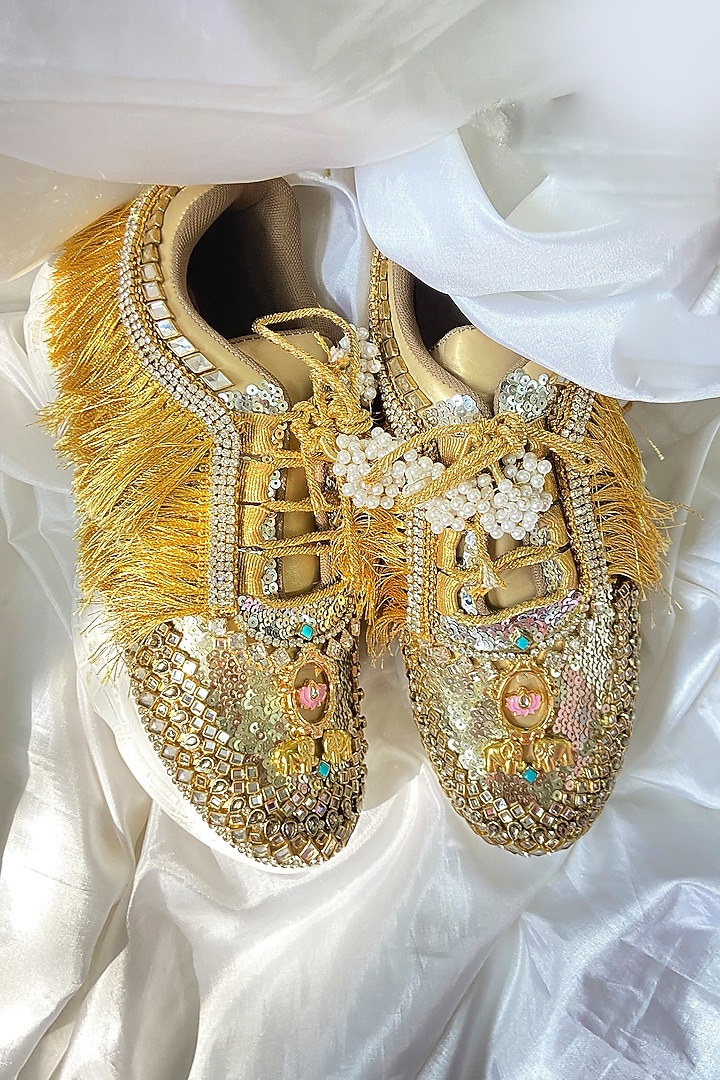 Gold Synthetic Leather Embellished Sneakers by Chal Jooti at Pernia's Pop Up Shop