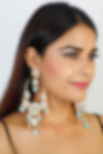 Gold Finish Dangler Earrings by Chhavi'S Jewels at Pernia's Pop Up Shop