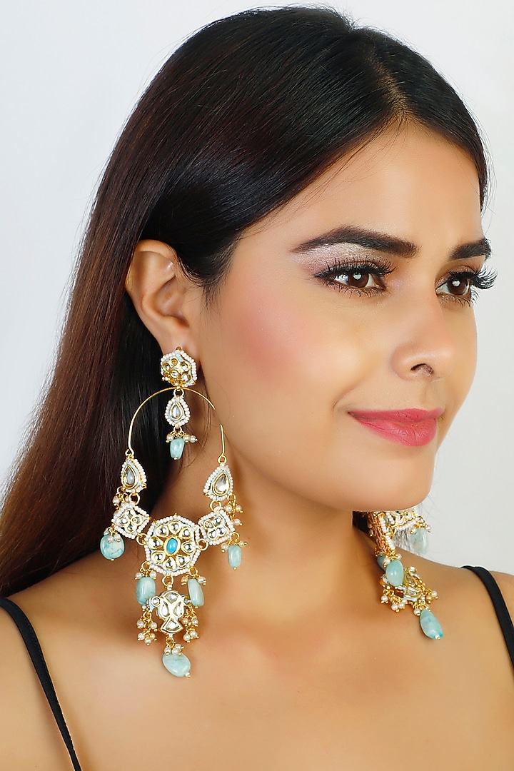 Gold Finish Dangler Earrings by Chhavi'S Jewels at Pernia's Pop Up Shop