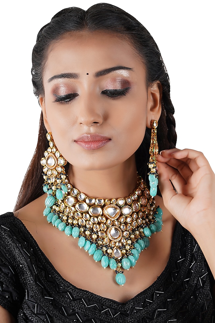 Gold Finish Necklace Set by Chhavi's Jewels