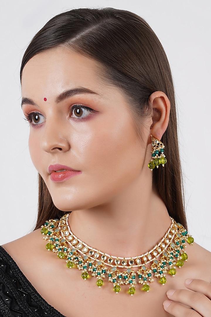 Gold Finish Kundan Necklace Set by Chhavi's Jewels