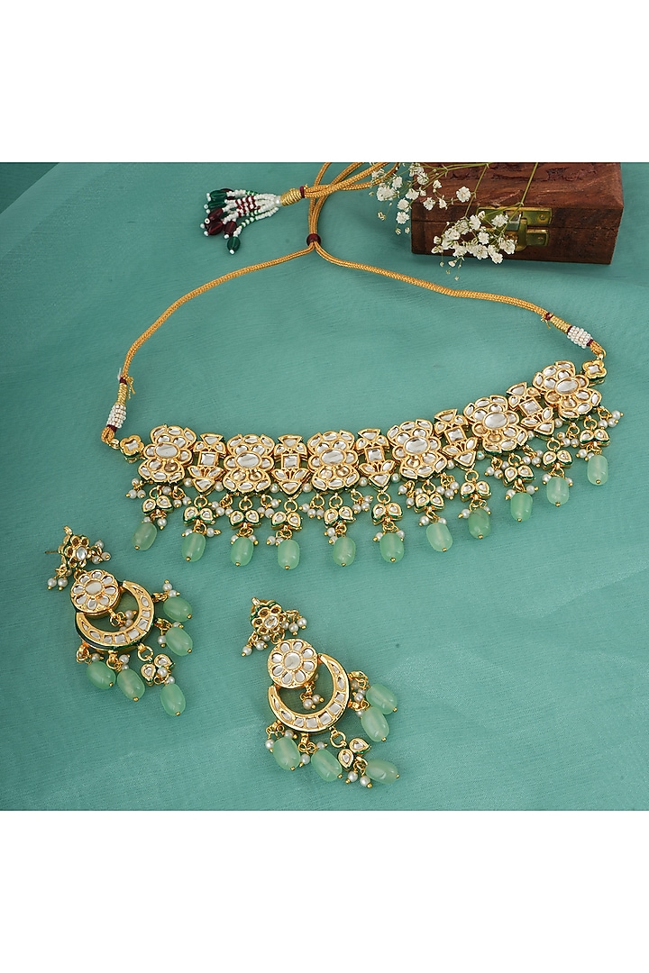 Gold Finish Kundan Polki & Green Stone Choker Necklace Set by Chhavi's Jewels at Pernia's Pop Up Shop