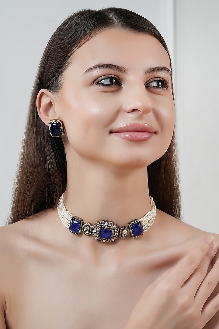 Gold Finish Kundan Polki & Blue Stone Choker Necklace Set by Chhavi's Jewels at Pernia's Pop Up Shop