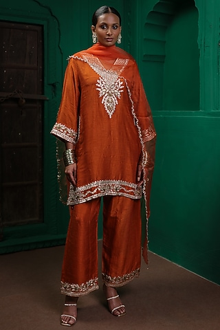 Rust Orange Slub Raw Silk Applique Embroidered Kurta Set by Charu Makkar