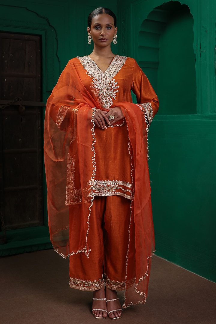 Rust Orange Slub Raw Silk Applique Embroidered Kurta Set by Charu Makkar at Pernia's Pop Up Shop