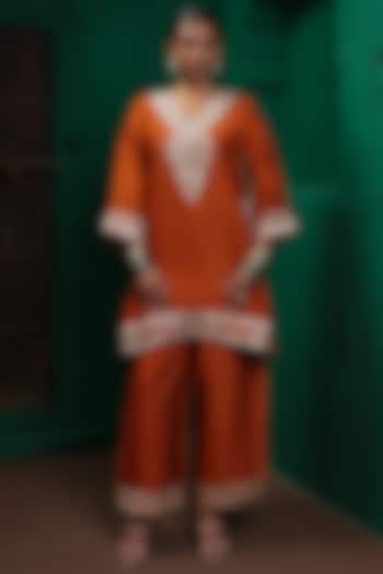 Rust Orange Slub Raw Silk Applique Embroidered Kurta Set by Charu Makkar at Pernia's Pop Up Shop