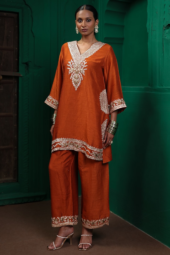 Rust Orange Slub Raw Silk Applique Embroidered Kurta Set by Charu Makkar at Pernia's Pop Up Shop
