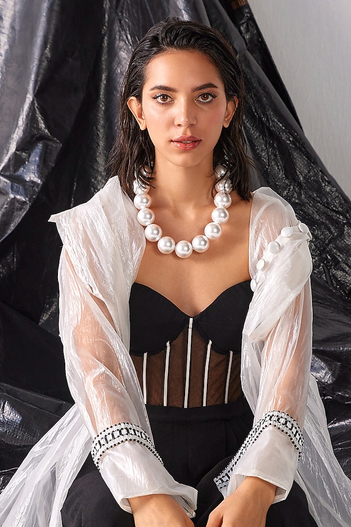 Black Textured Crepe Fabric Corset Jumpsuit With Jacket by CP by Chandini and Priyanka at Pernia's Pop Up Shop