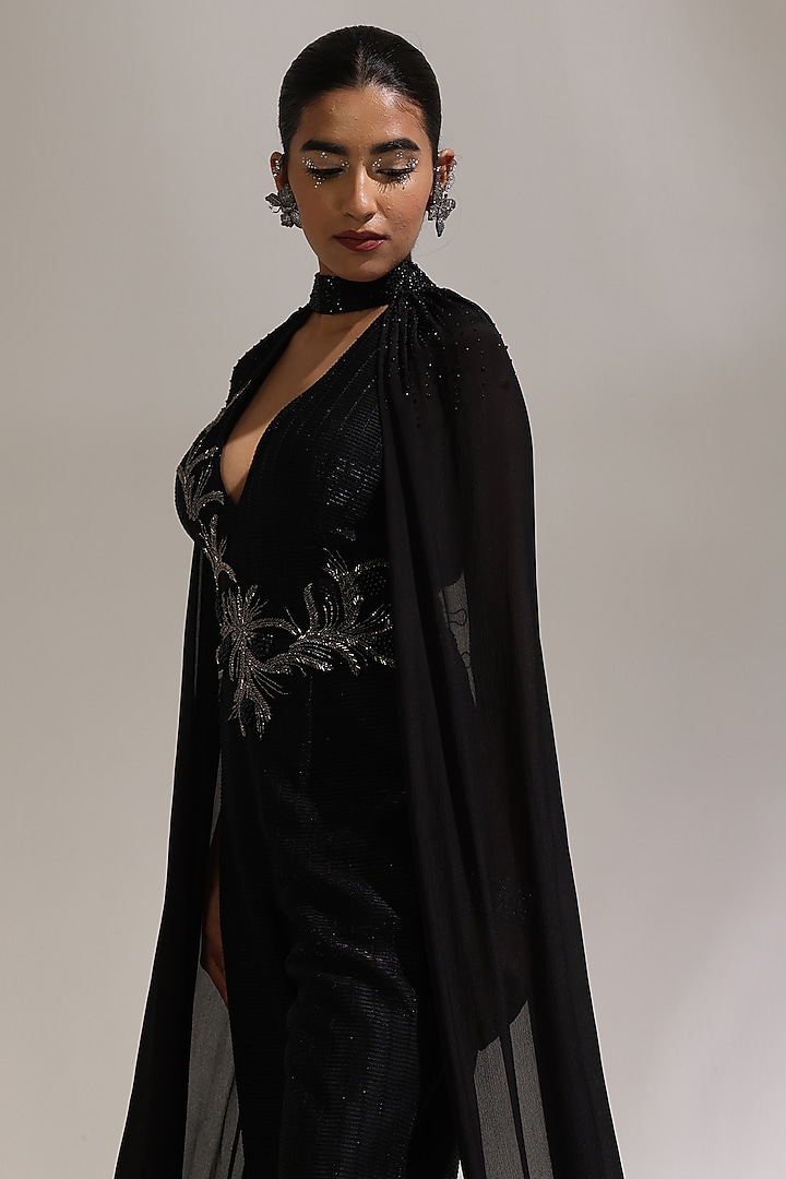 Ebony Black Textured Fabric & Gossamer Chiffon Jumpsuit With Cape by CP by Chandini and Priyanka at Pernia's Pop Up Shop