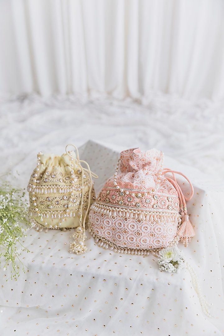 Peach Cotton Embroidered Potli For Girls by Chotibuti at Pernia's Pop Up Shop