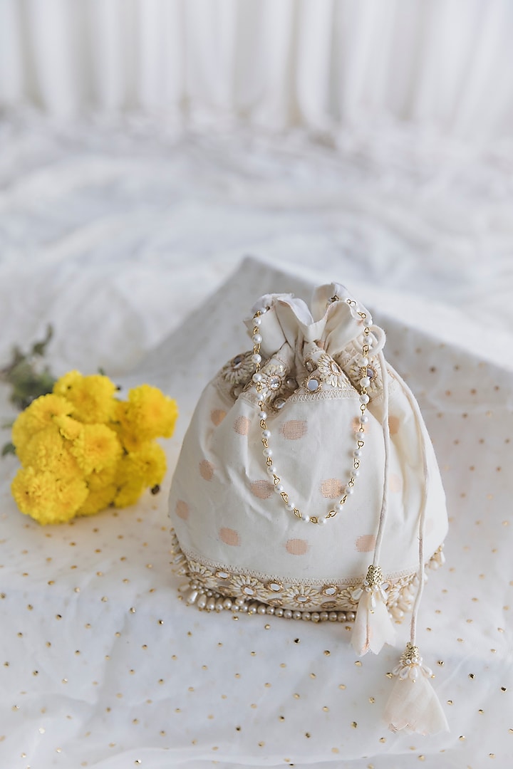Ivory Cotton Embroidered Potli For Girls by Chotibuti at Pernia's Pop Up Shop