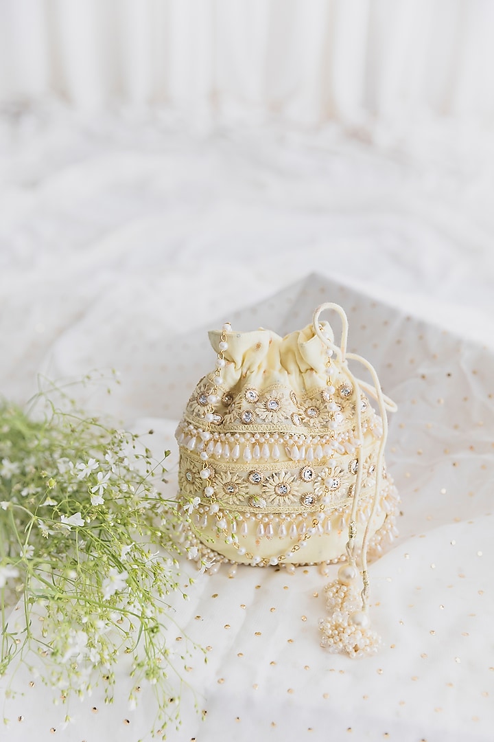 Pastel Yellow Cotton Embroidered Potli For Girls by Chotibuti at Pernia's Pop Up Shop