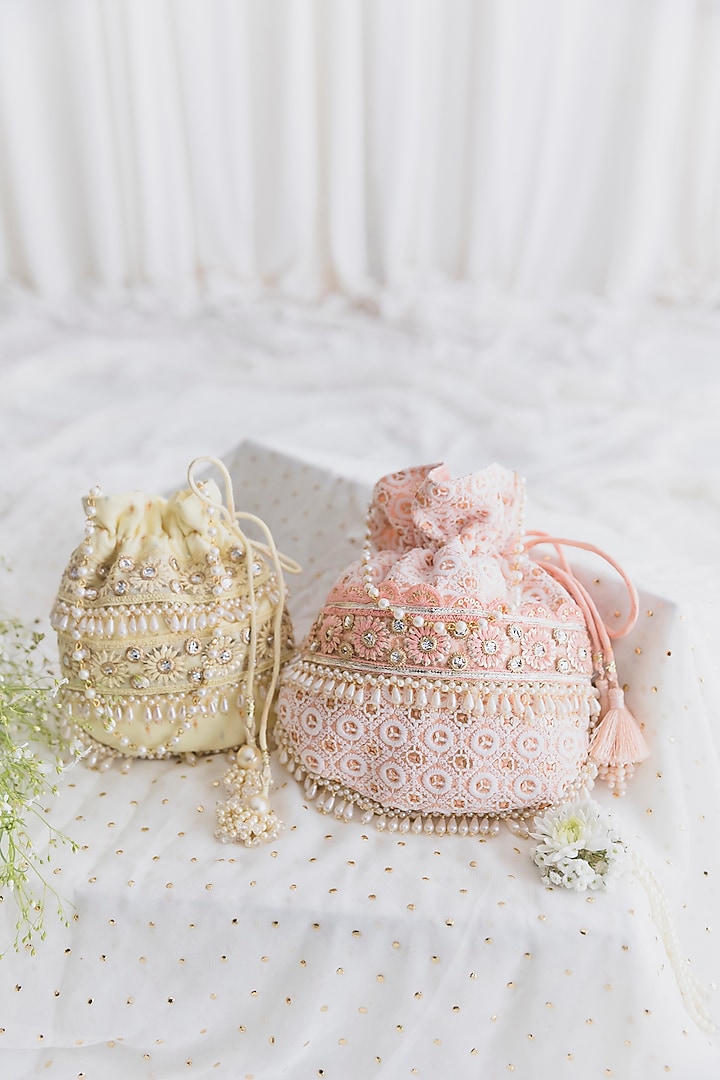 Pastel Yellow Cotton Embroidered Potli For Girls by Chotibuti at Pernia's Pop Up Shop