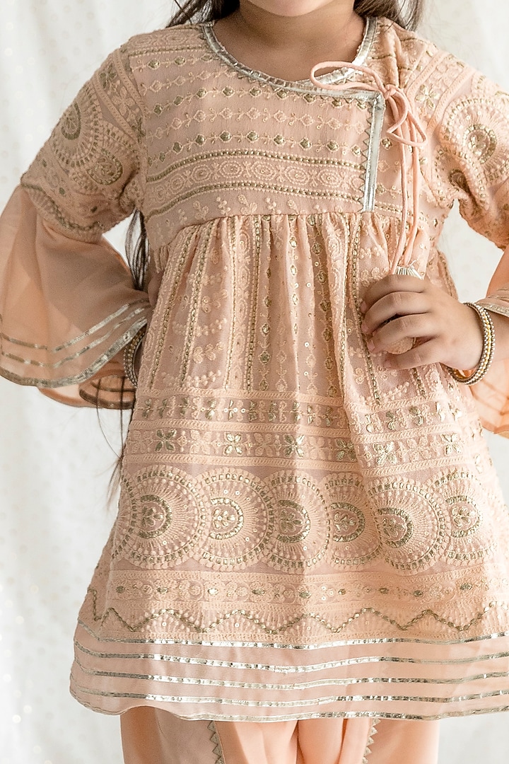 Peach Chikankari Sequins Embroidered Peplum Kurta Set by Chotibuti at Pernia's Pop Up Shop