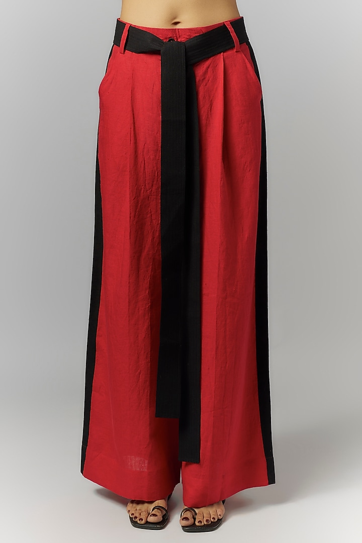 Red Linen Pleated Trousers by Chola at Pernia's Pop Up Shop