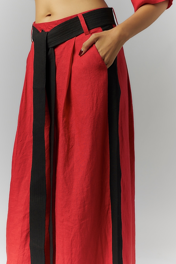 Red Linen Pleated Trousers by Chola at Pernia's Pop Up Shop