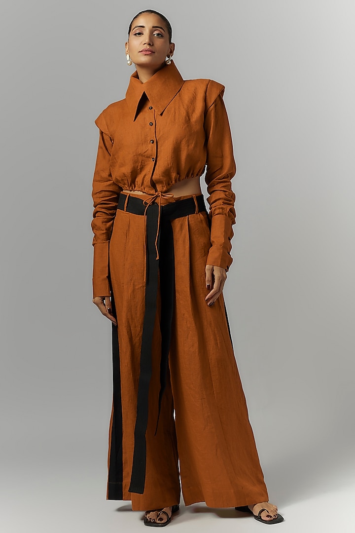 Rust Linen Pleated Trousers by Chola at Pernia's Pop Up Shop