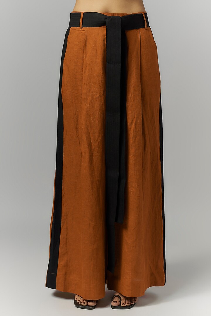 Rust Linen Pleated Trousers by Chola at Pernia's Pop Up Shop