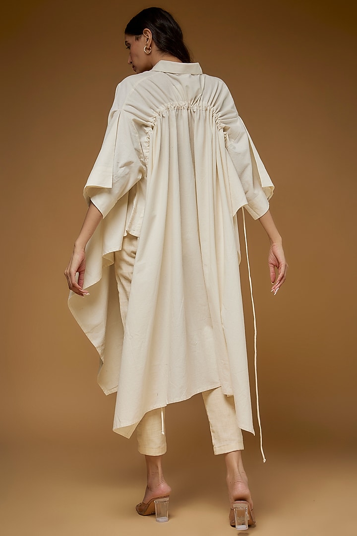White Organic Cotton Asymmetrical Cape Shirt by Chola at Pernia's Pop Up Shop
