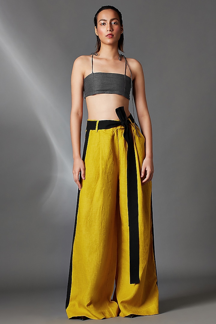 Mustard Linen Pleated Trousers With Belt by Chola at Pernia's Pop Up Shop