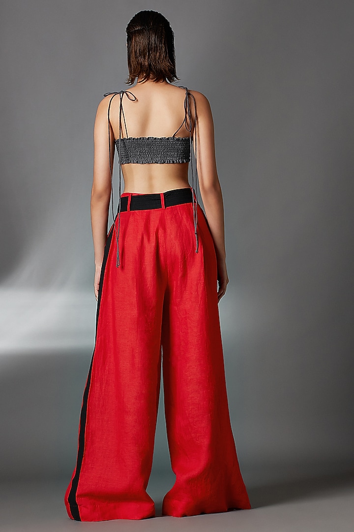 Red Linen Pleated Trousers With Belt by Chola at Pernia's Pop Up Shop