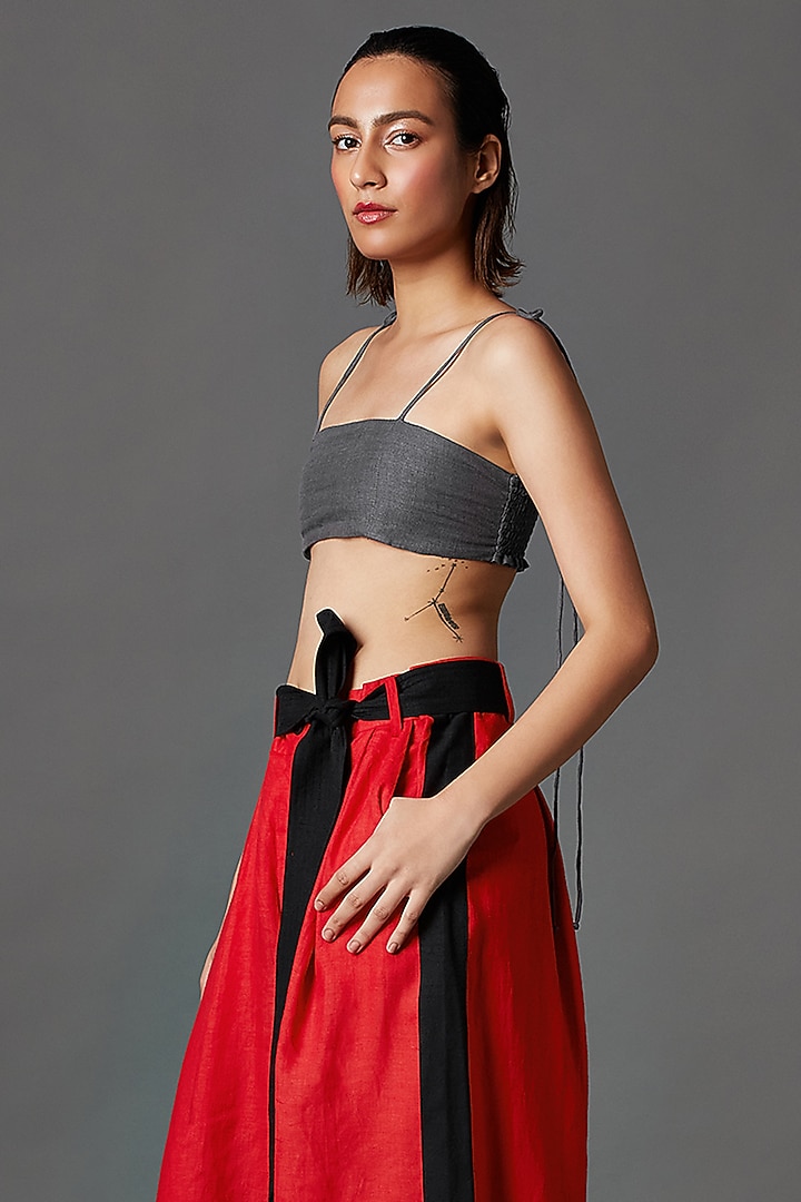 Red Linen Pleated Trousers With Belt by Chola at Pernia's Pop Up Shop