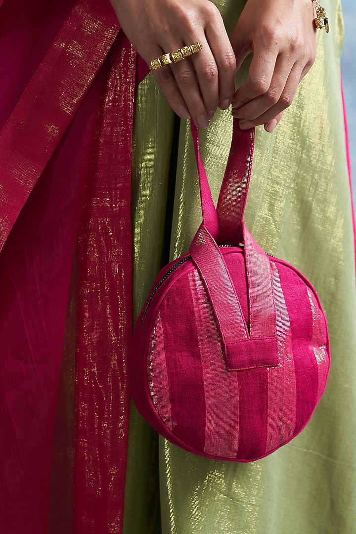 Fuchsia Pink Linen & Cotton Shimmer Round Potli Bag by Charkhee Accessories at Pernia's Pop Up Shop