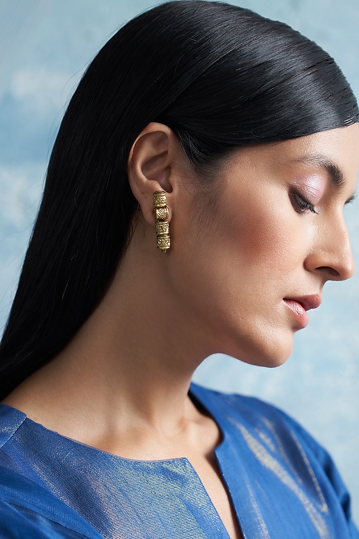 Gold Finish Aura Dangler Earrings by Charkhee Accessories at Pernia's Pop Up Shop