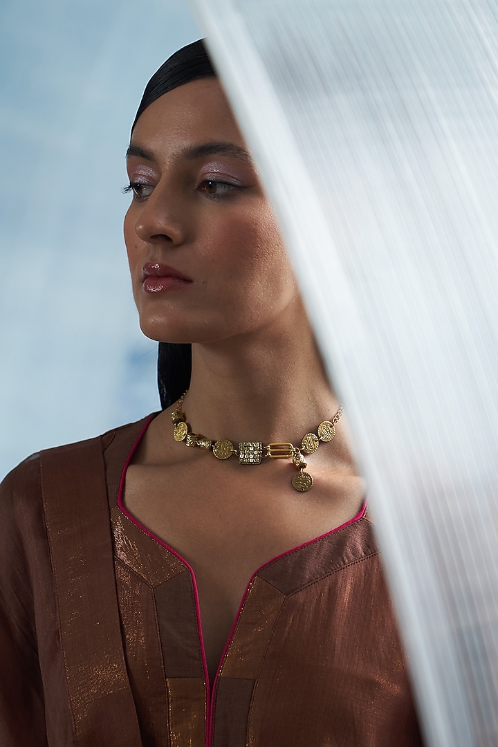 Gold Finish Aura Elemental Necklace by Charkhee Accessories at Pernia's Pop Up Shop
