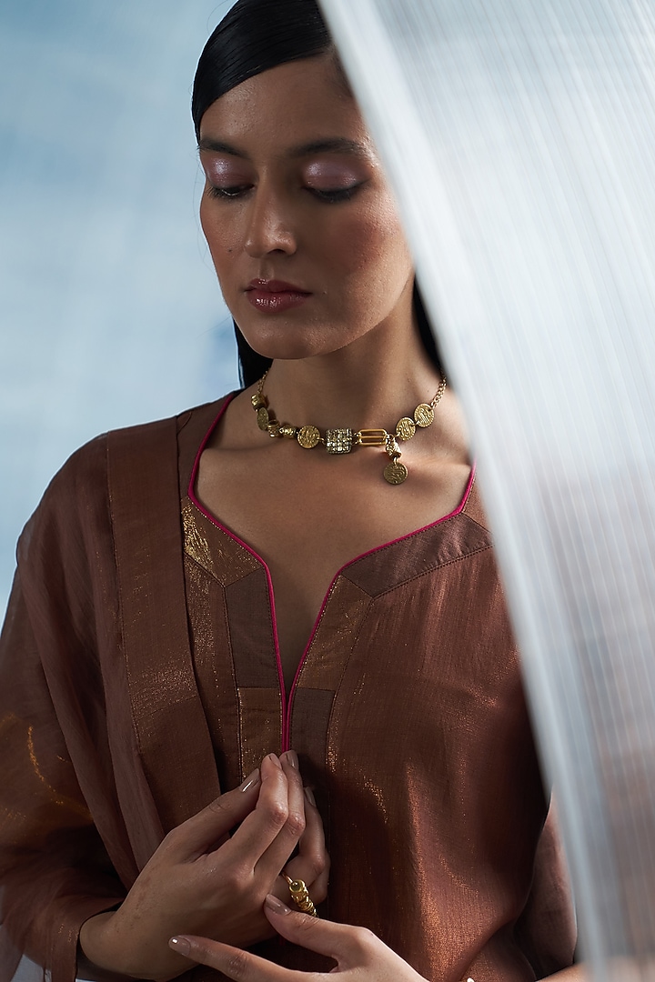 Gold Finish Aura Elemental Necklace by Charkhee Accessories at Pernia's Pop Up Shop
