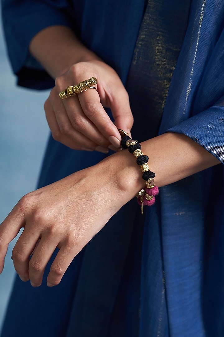 Gold Finish Aura Chimes Bracelet by Charkhee Accessories at Pernia's Pop Up Shop
