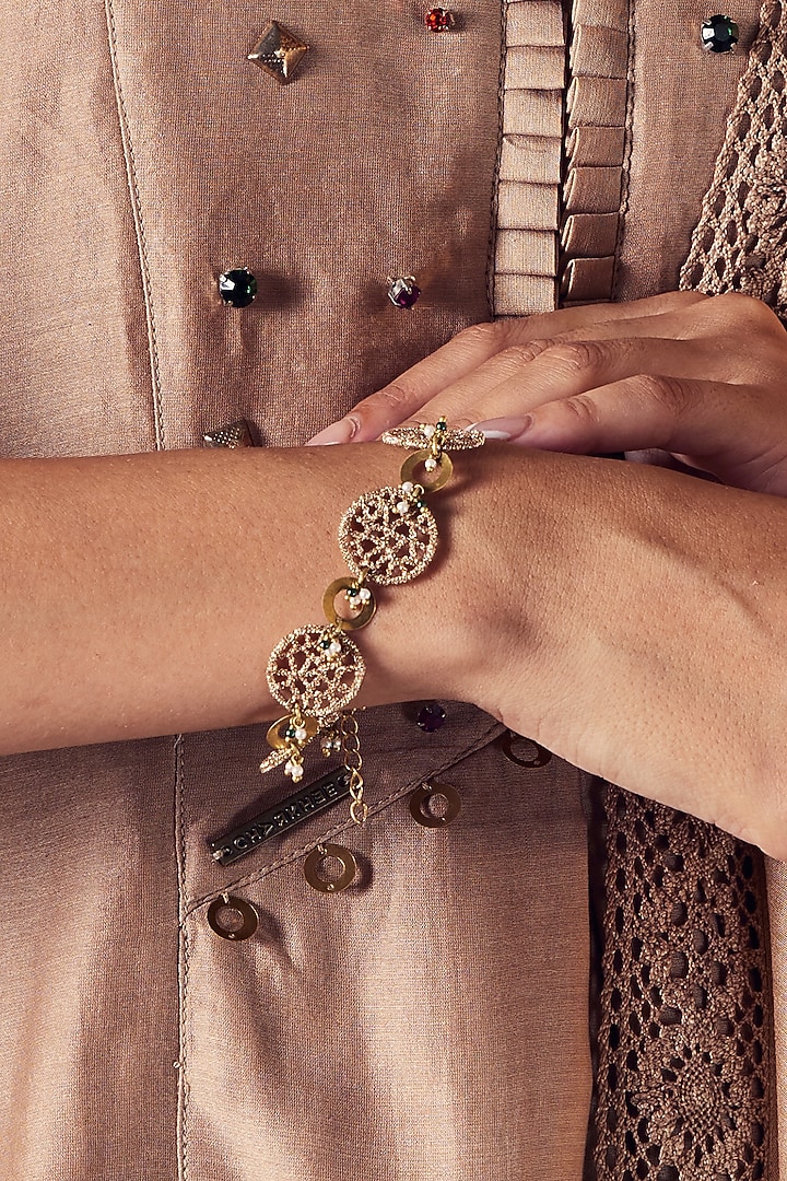 Gold Finish Embroidered Bracelet by Charkhee Accessories at Pernia's Pop Up Shop